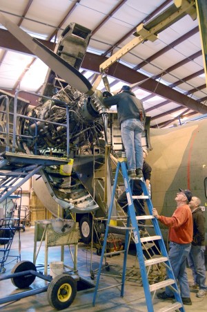 Greg, Jim and Lee reinstalling the prop on the C-123K